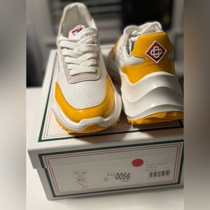 Atlantis Leather Low Top Sneakers In Yellow
Size UK 7 USA 8